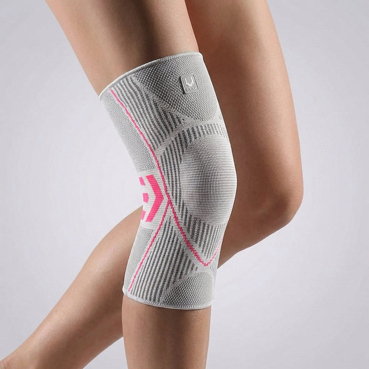 Rosa Unisex Kompressions-Kniebandage aus Polyester für Sport & Alltag. Aktiver Knieschutz.