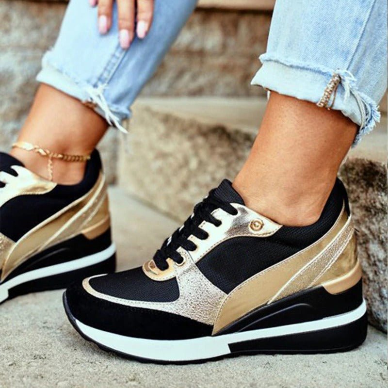 Nahaufnahme der orthopädischen Damen Schnürschuhe mit goldenen Details