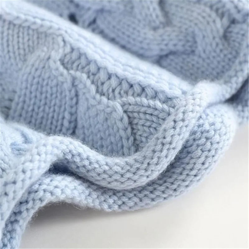 Stilvolles Outfit mit Strickpullover und Stiefeletten