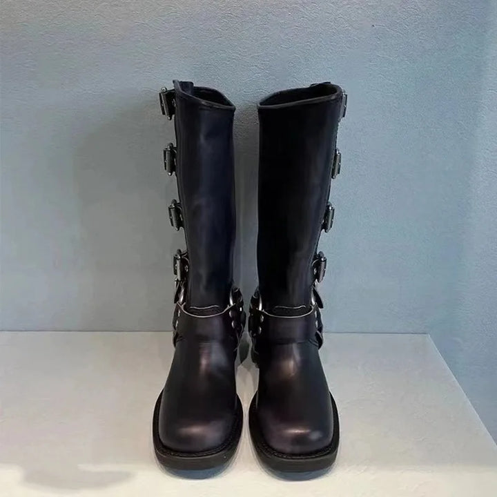 Modische schwarze kniehohe Westernstiefel für Damen mit seitlichen Schnallen, ideal für den Alltag.