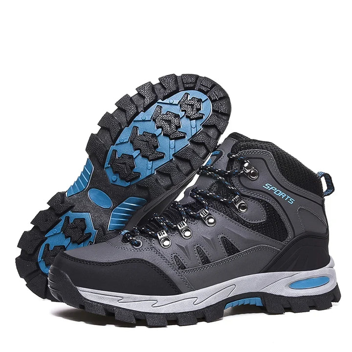 Graue Damen Wanderstiefel knöchelhoch, mit rutschfester Profilsohle für sichere Outdoor-Abenteuer.