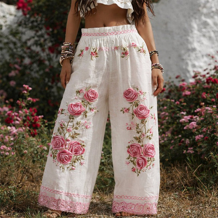 Elegante weiße Sommerhose für Damen mit Blumenstickerei