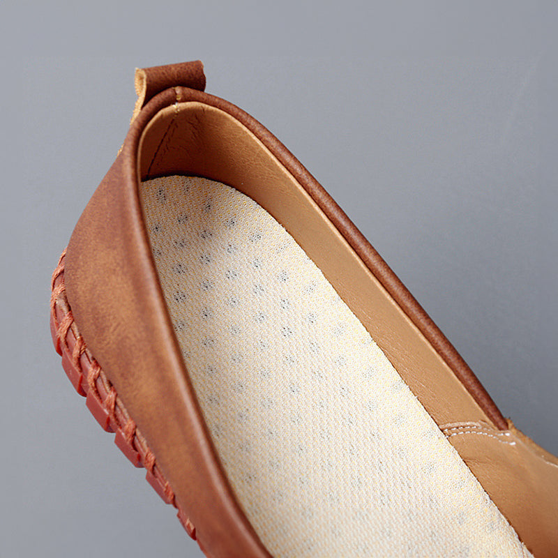 Komfortable Herren Slipper: Graue Slip-On Schuhe, perfekt für lange Tage im Büro oder in der Freizeit.