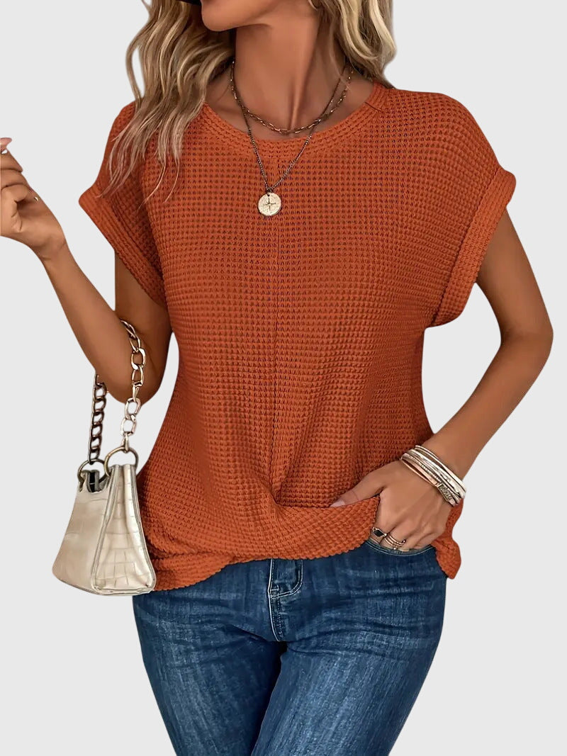 Damen Waffelstrick Bluse in Orange mit Rundhals und kurzen Ärmeln