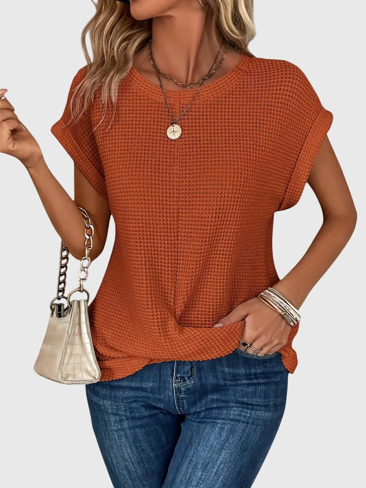 Damen Waffelstrick Bluse in Orange mit Rundhals und kurzen Ärmeln