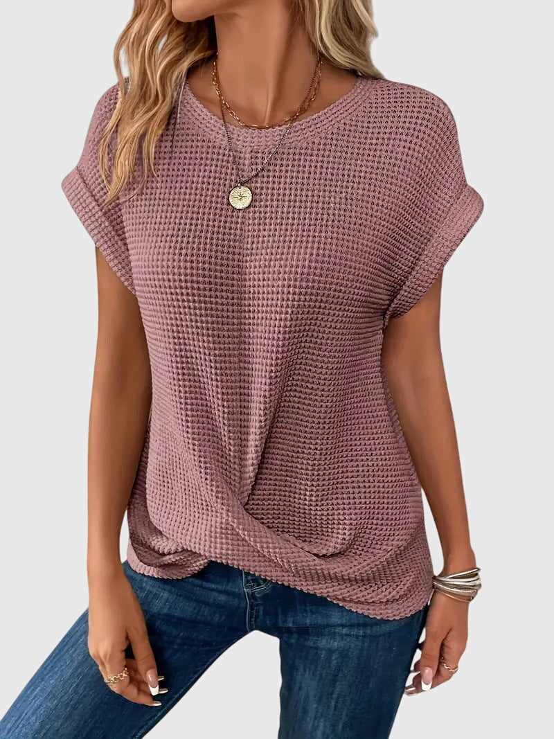 Damen Waffelstrick Bluse in Rosa kombiniert mit blauer Jeans