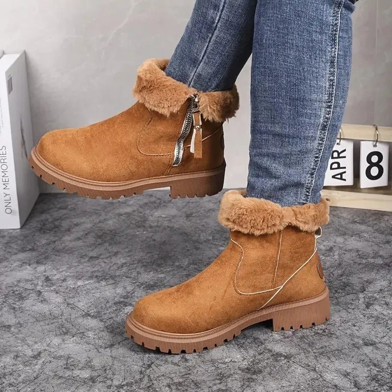 Damen Winterstiefel im Einsatz: Sie garantieren rutschfesten Stand bei Spaziergängen im Schnee dank Profilsohle.