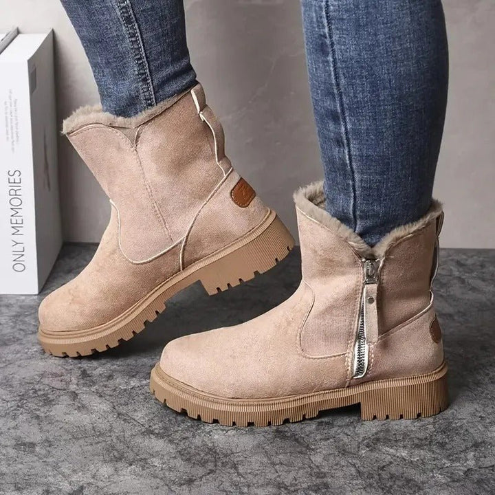 Wasserdichte Damen Winterstiefel schützen vor Nässe. Perfekt für Schnee und Regen, mit rutschfester Sohle.