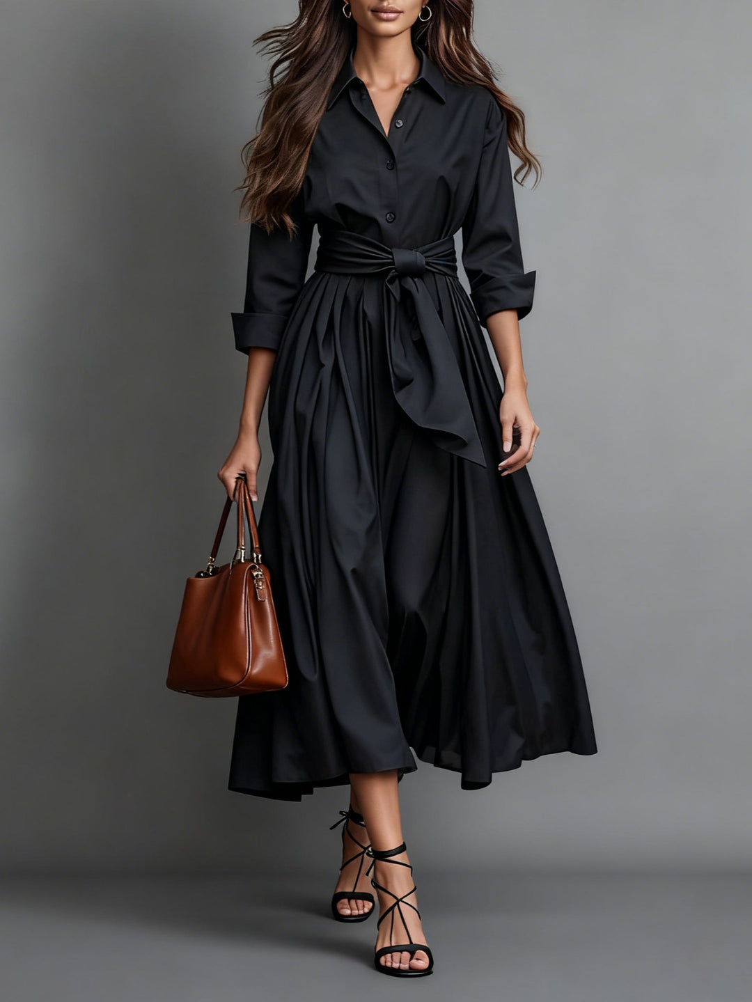 Damen Maxikleid in Schwarz mit Taillengürtel und langer Handtasche