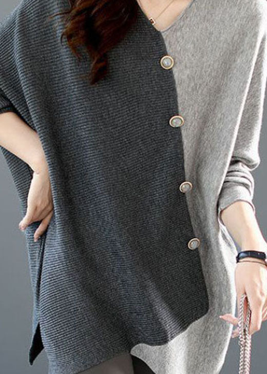 Nahaufnahme des asymmetrischen Damen Strickshirts mit Patchwork-Muster; elegantes, warmes Oberteil für Herbst/Winter.