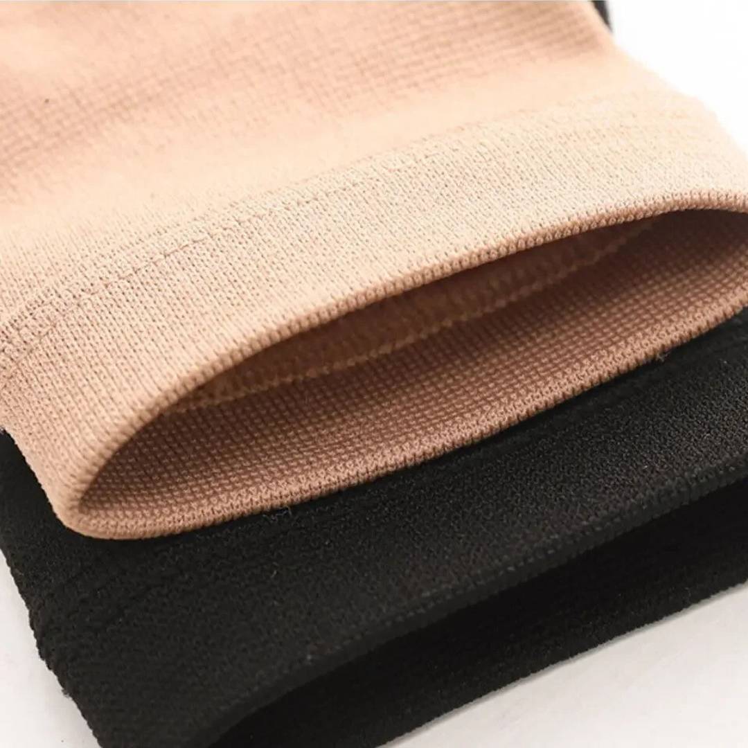"Beige Handgelenk-Kompressionsmanschette mit Daumenstütze für Schmerzlinderung und Schwellungsreduktion. Größen S bis XL."