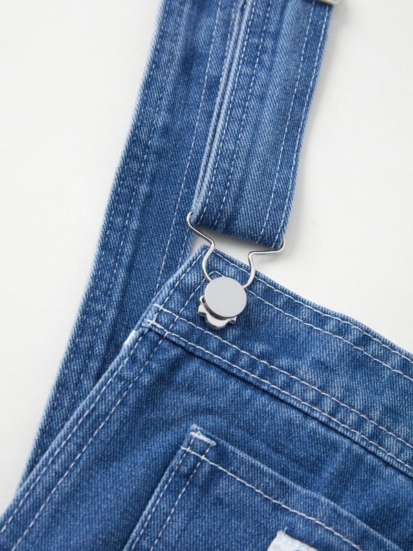 Moderne Damen Latzhose im Boyfriend-Schnitt. Blauer Vintage Denim Overall für einen trendigen, lässigen Look.