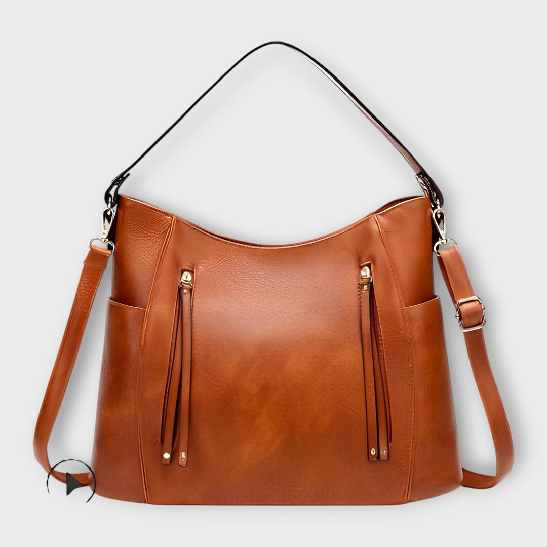 Braune, vielseitige Damen-Schultertasche für den Alltag; stilvoll, modern und praktisch als Umhängetasche.