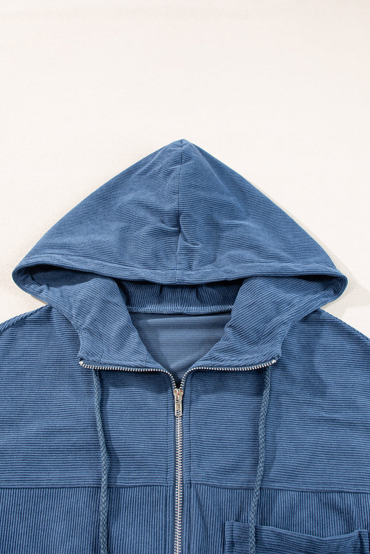 Blaugrüne Cordjacke mit Kapuze und Kordelzug