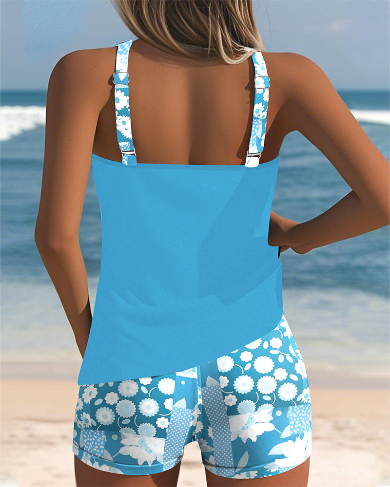 Weibliches Schwimmanzug Set aus Tanktop & Shorts in Rosa, ideal für aktive Tage am Strand.