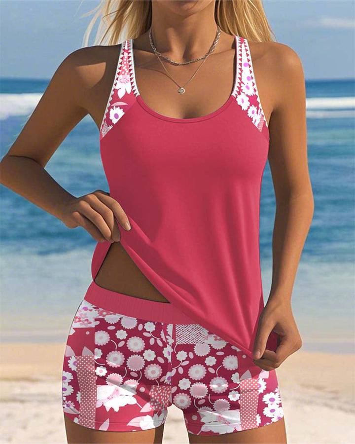 Leuchtend rosa Damen Bademoden Zweiteiler: Tanktop & Shorts für einen stylischen Sommerlook.