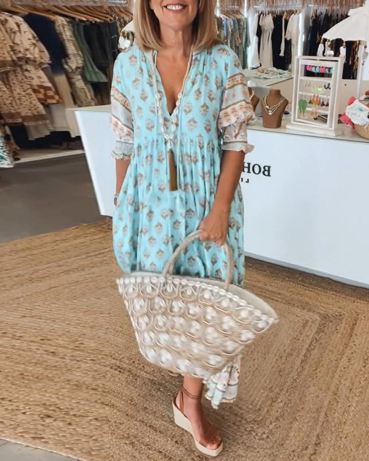 Damen bedrucktes Midikleid mit V-Ausschnitt. Leichtes Sommerkleid, perfekt für Urlaub & Freizeit.