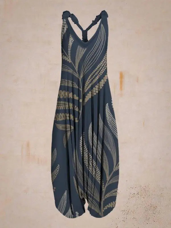 Eleganter Damen Boho Overall mit weitem Bein und Muster, perfekter Freizeit Jumpsuit für warme Sommertage.