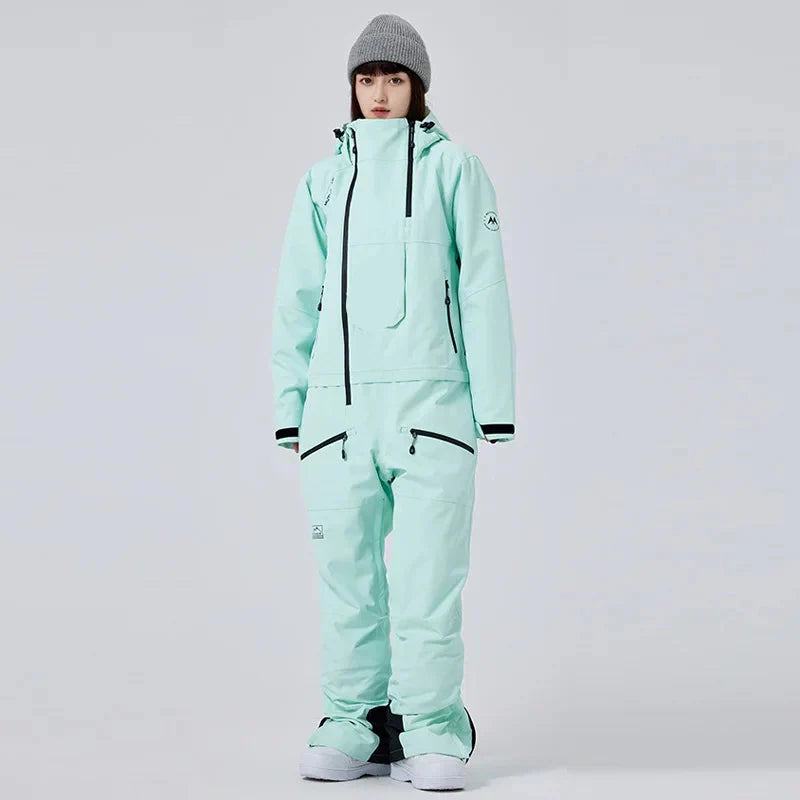 Damen Einteiler Skianzug, wasserdicht & warm, ideal für Wintersport und Snowboard. Bequemer Winter Overall für Frauen.