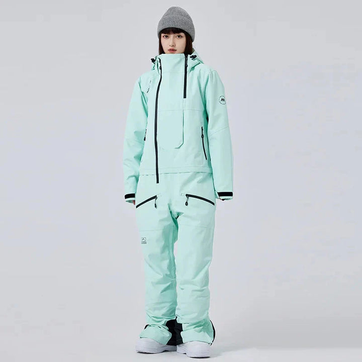 Damen Einteiler Skianzug, wasserdicht & warm, ideal für Wintersport und Snowboard. Bequemer Winter Overall für Frauen.