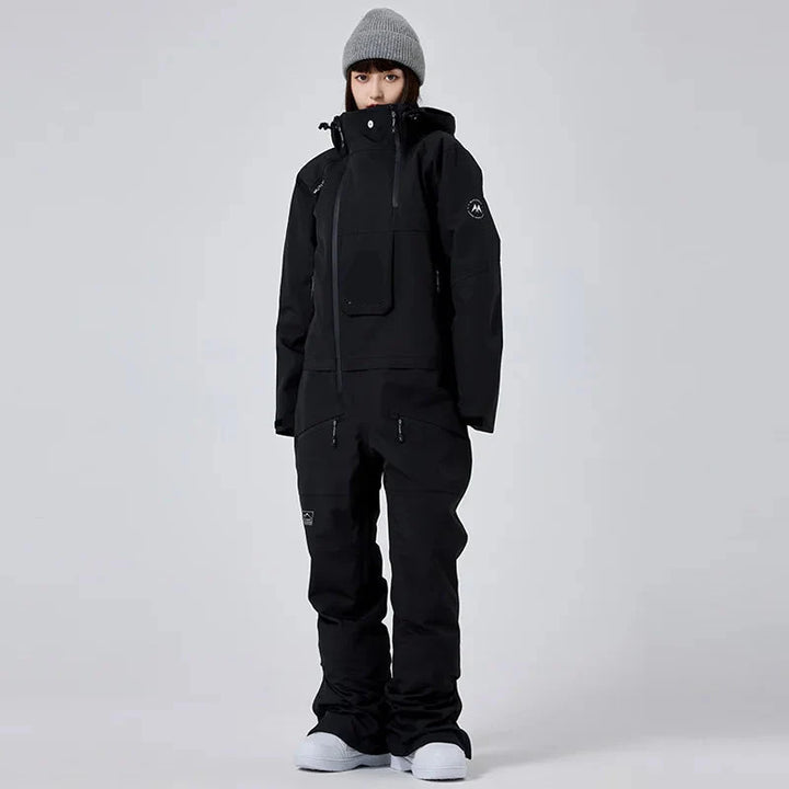 Warmer Damen Skianzug Einteiler, wasserdicht & winddicht. Perfekte Skibekleidung für kalte Wintertage. Hoher Tragekomfort.