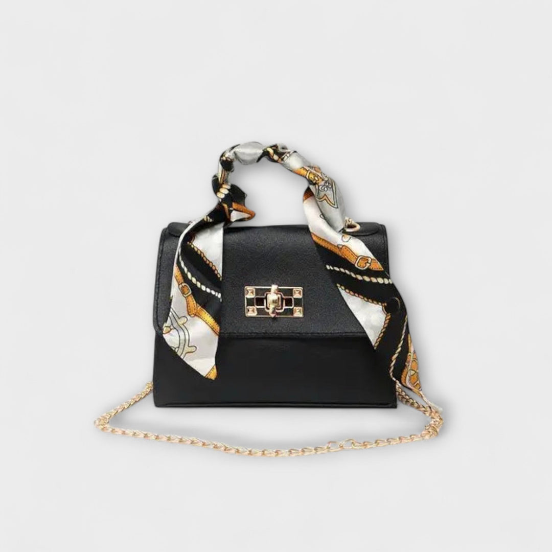 Damen Elegante Handtasche mit stilvollem Kettenriemen, perfekt für Abend und Sommer. Eine moderne Schultertasche.