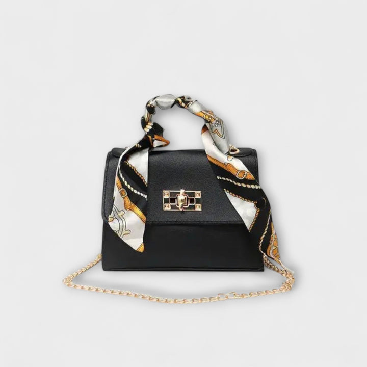 Damen Elegante Handtasche mit stilvollem Kettenriemen, perfekt für Abend und Sommer. Eine moderne Schultertasche.