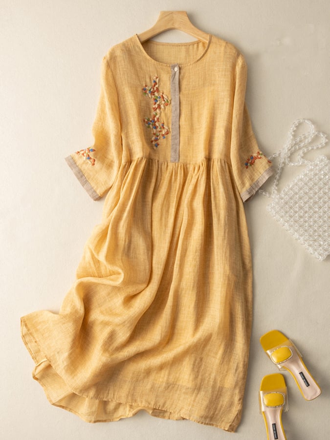 Damen Ethno Midi Kleid mit farbenfroher Stickerei für einen eleganten Sommer-Look.