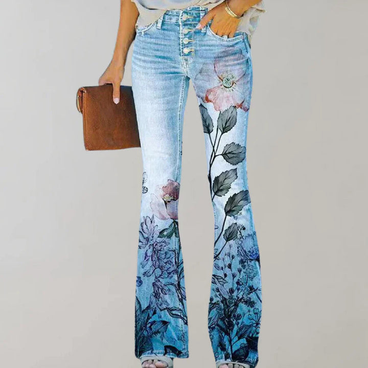 Moderne Damen Schlagjeans mit Blumenmuster, hoher Bund, für einen modischen Auftritt.