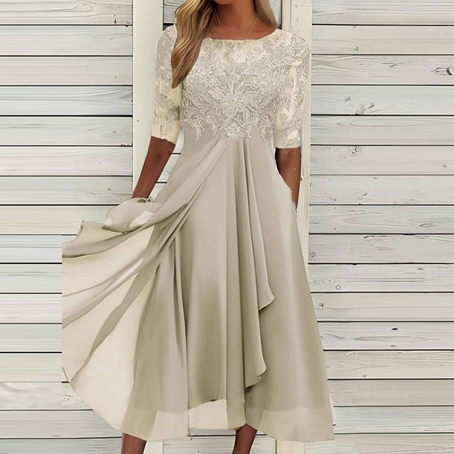 Fließendes ärmelloses Damen Herbstkleid, Midilänge, A-Linien-Design für stilvolle Frauenmode 2024.