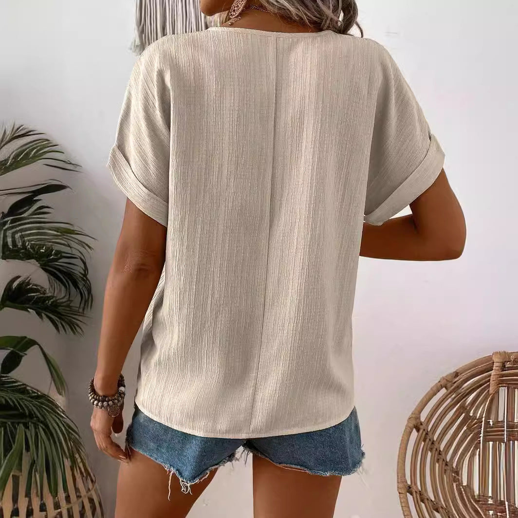 Elegante Damen Bluse Apricot mit V-Ausschnitt und kurzer Knopfleiste, vielseitig für Frühling & Sommer.