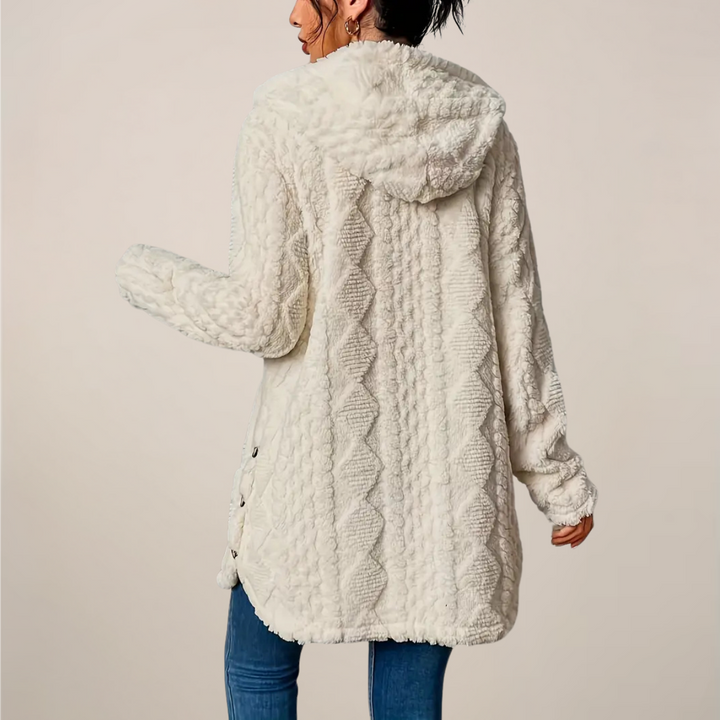 Lässige Übergangs-Kapuzenjacke für Damen. Strukturierter Stoff verleiht einen eleganten Touch.