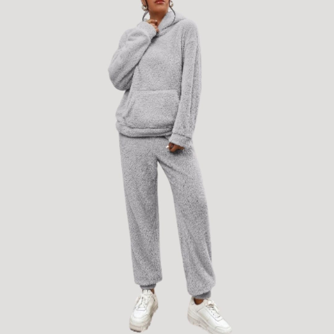 Stylisches Damen Frühlings-Loungewear-Set in Hellgrau, Kapuzenpullover und Jogginghose, bequem.