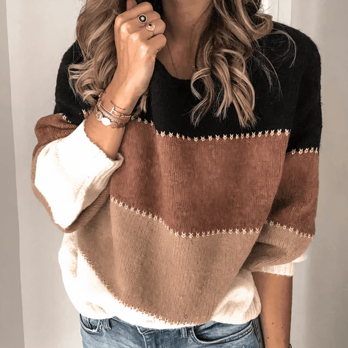 Modischer Damen Herbstpullover, gestreift, mit weitem Schnitt. Perfekt für casual Wintermode und Freizeitkleidung.
