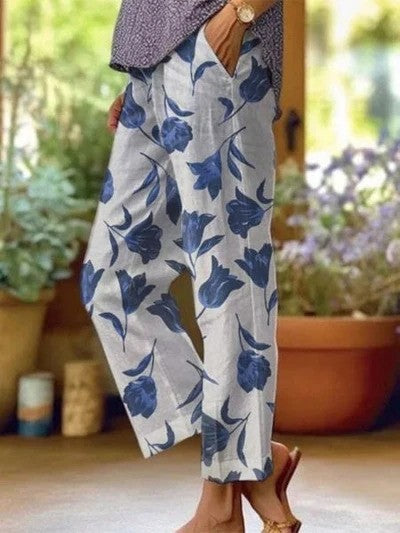 Damen Herbsthose mit weitem Bein, floralem Muster und Elastikbund. Ideal für bequeme Frühlings- und Herbstlooks.