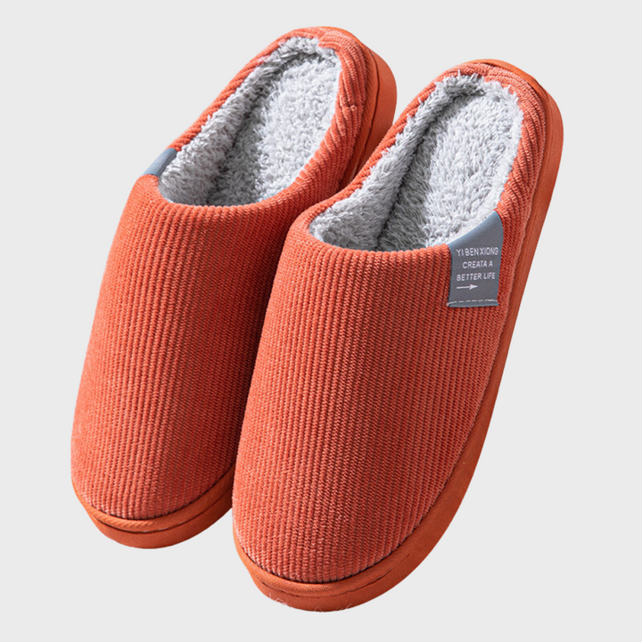 Rutschfeste Damen Hygge Hausschuhe mit weichem Futter. Sichere und warme Heimschuhe für gemütliche Winterabende.