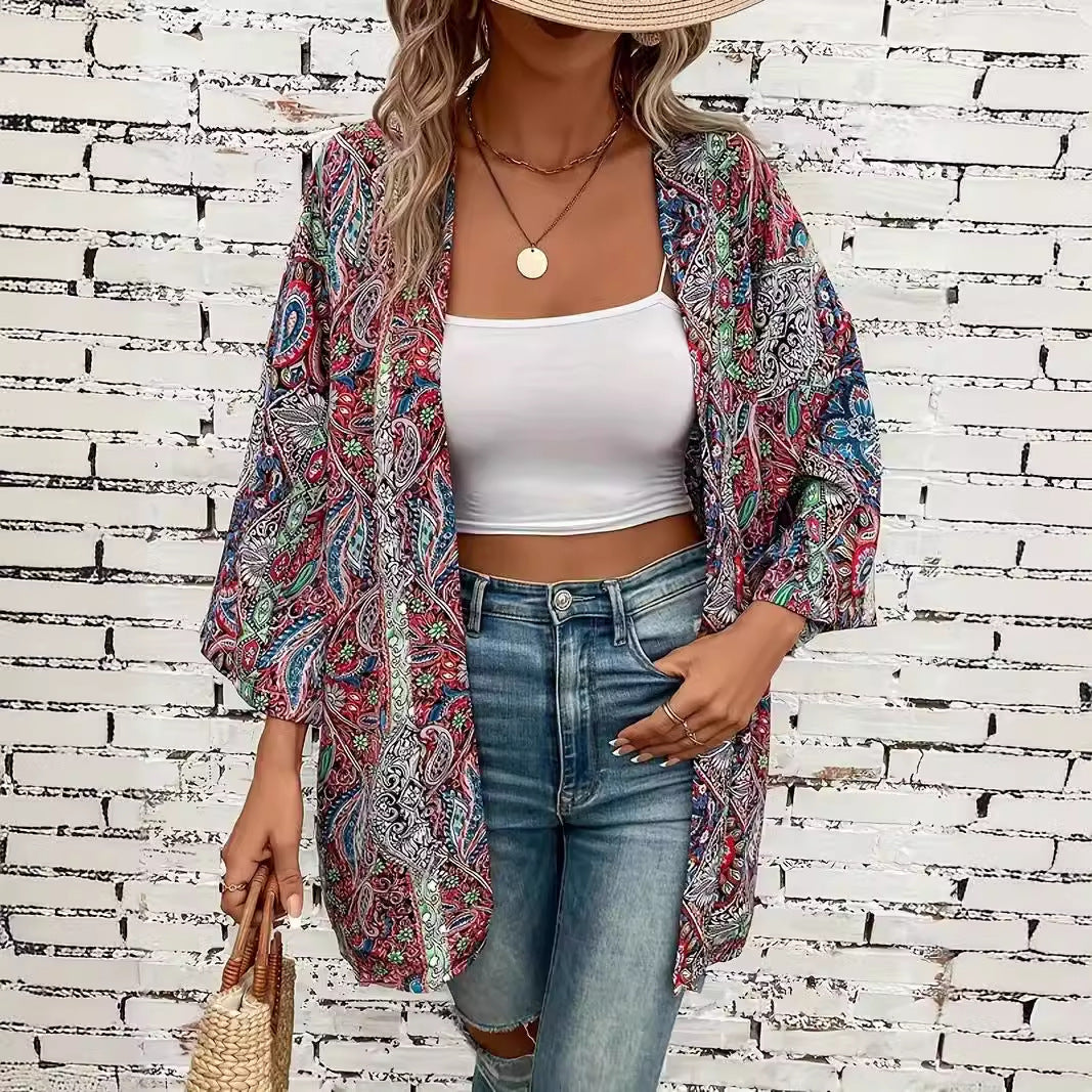 Langarm-Damenbluse im Kimono-Stil mit einzigartigem Ethnomuster und Rundhals. Perfekt für modische Herbstlooks.