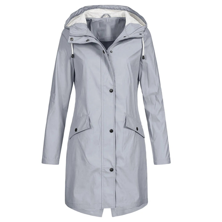 Vielseitige lange Damen-Regenjacke mit Kapuze, perfekt für Spaziergänge und Alltag im Herbst bei Nässe.