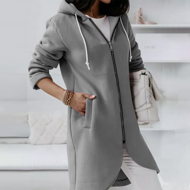 Frontansicht Damen Longline Zip-Up Hoodie, durchgehender Reißverschluss, Kängurutaschen, Kapuze.