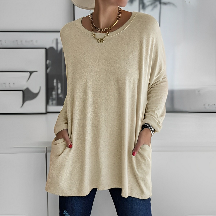 Weicher Damen Pullover, lang geschnitten, mit praktischen Taschen. Dein bequemer Alltagsbegleiter.