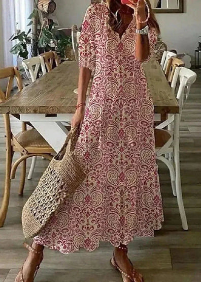 Leichtes Sommerkleid für Frauen mit Blumenprint und Kordelzug, elegant und bequem für warme Tage.
