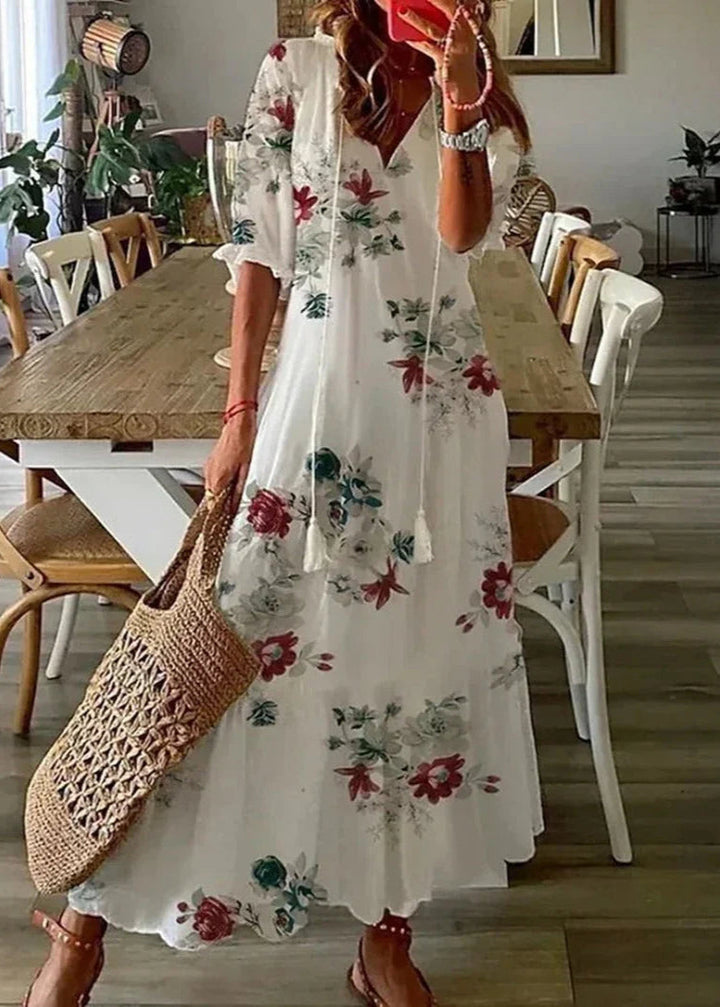 Rotes Damen Maxikleid mit Blumenmuster und Kordelzug, kurzärmlig, fließend, ideal für sommerliche Anlässe.
