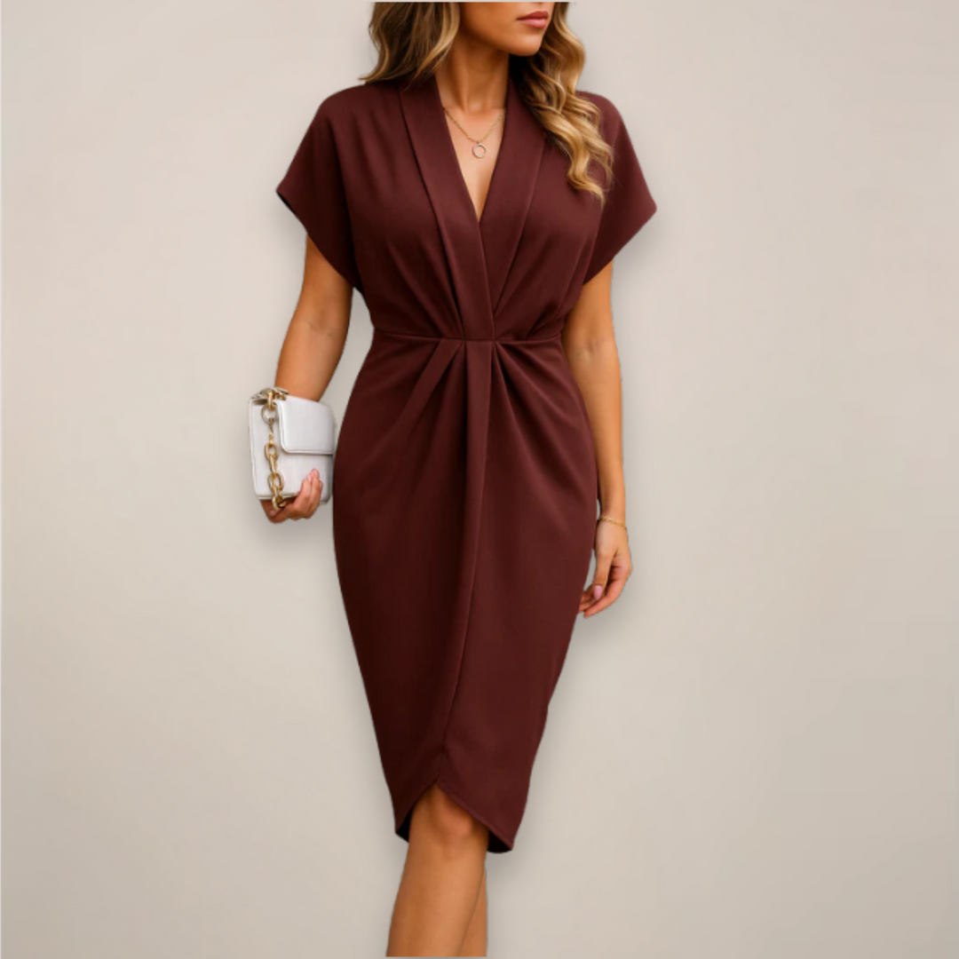 Modisches Damenwickelkleid, knielang und luftig, ideal für sommerliche Tage & elegante Auftritte.