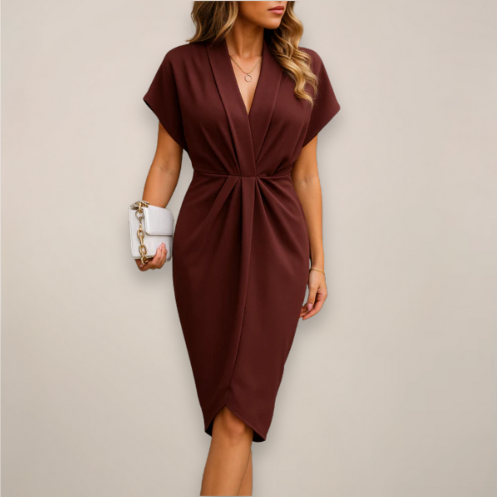 Modisches Damenwickelkleid, knielang und luftig, ideal für sommerliche Tage & elegante Auftritte.