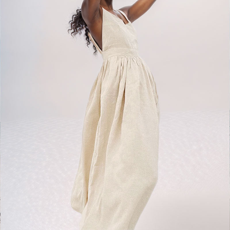 Stilvolles Damen Sommer-Midikleid mit V-Ausschnitt und rückenfreiem Design. Fließend geschnitten mit sexy Seitenschlitz.