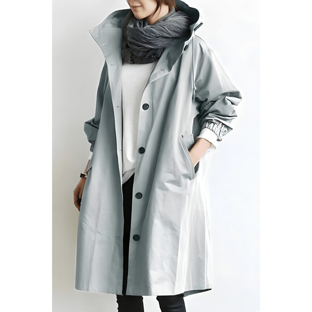 Eleganter Damen Trenchcoat Midilänge mit Reverskragen. Ideale Übergangsjacke für stilvolle Herbstoutfits.