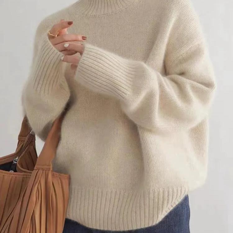 Damen Winter Oversize-Pullover mit geripptem Rollkragen. Weicher Strick, stilvoll für kalte Tage.