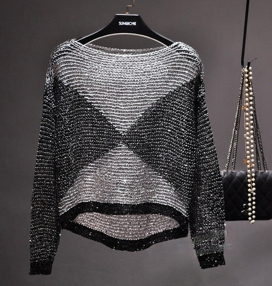 Schimmerndes Damen Glitzer Oberteil mit Pailletten und langen Ärmeln, perfekt als elegantes Abendmode und Party Top.