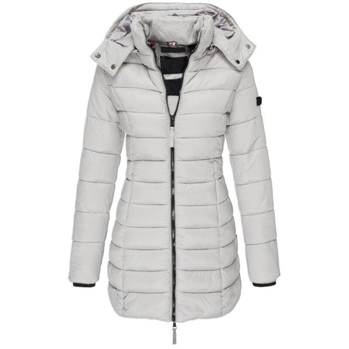 Damen Parka Mantel mit Kapuze. Eleganter, langer Damen Wintermantel, warm und stilvoll für die Wintermode.