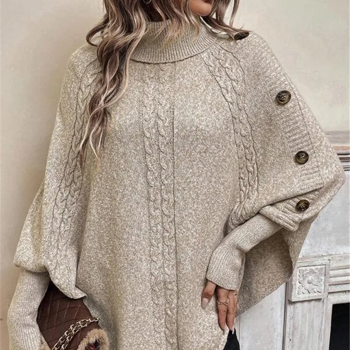 Bequemer Damen Poncho Rollkragen im Oversize-Schnitt für legeren Lagenlook. Vielseitige Wintermode mit Knopfdetails.